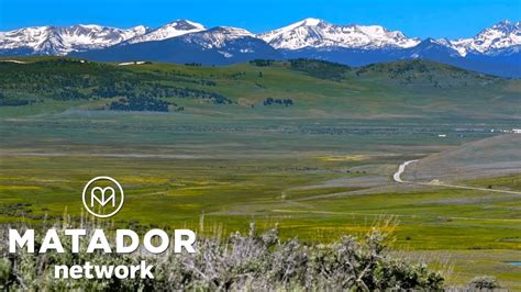 Road Tripping Through Montanas Open Prairie  Mountain Ranges